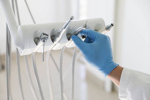 Professional Tooth Extraction technician working in Cascades, VA